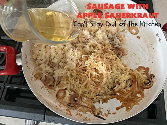 Sausage with Apple Sauerkraut | Can't Stay Out of the Kitchen | this is a terrific way to enjoy #PolishSausage, #apples & #sauerkraut especially if you need to get dinner on the table quickly. This #30MinuteRecipe is seasoned wonderfully with grated #apples, #AppleJuice, #CarawaySeed & #FennelSeed. The #onions are #caramelized quickly & make this #pork #entree even better. #GlutenFree #sausage #SausageWithAppleSauerkraut