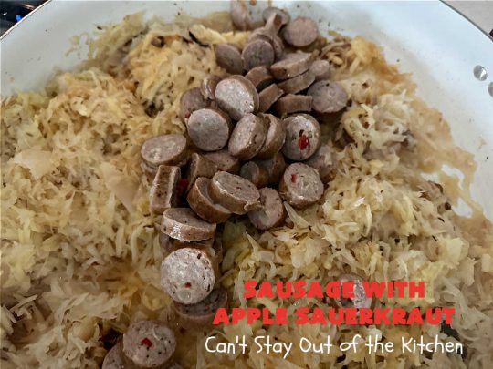 Sausage with Apple Sauerkraut | Can't Stay Out of the Kitchen | this is a terrific way to enjoy #PolishSausage, #apples & #sauerkraut especially if you need to get dinner on the table quickly. This #30MinuteRecipe is seasoned wonderfully with grated #apples, #AppleJuice, #CarawaySeed & #FennelSeed. The #onions are #caramelized quickly & make this #pork #entree even better. #GlutenFree #sausage #SausageWithAppleSauerkraut