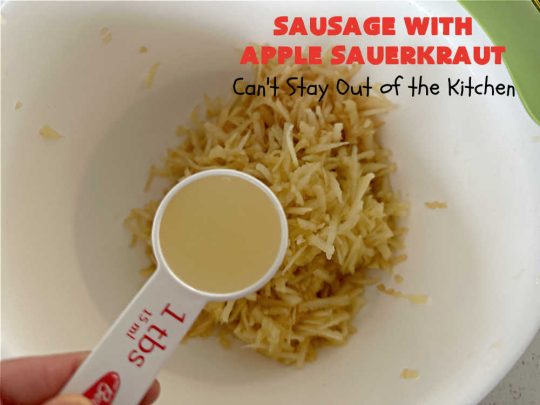 Sausage with Apple Sauerkraut | Can't Stay Out of the Kitchen | this is a terrific way to enjoy #PolishSausage, #apples & #sauerkraut especially if you need to get dinner on the table quickly. This #30MinuteRecipe is seasoned wonderfully with grated #apples, #AppleJuice, #CarawaySeed & #FennelSeed. The #onions are #caramelized quickly & make this #pork #entree even better. #GlutenFree #sausage #SausageWithAppleSauerkraut