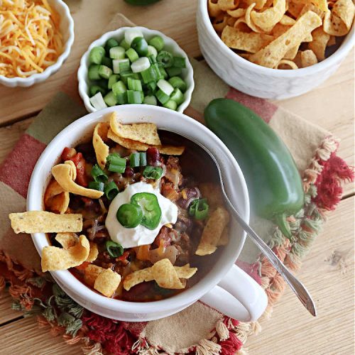 Slow Cooker Chunky Chili | Can't Stay Out of the Kitchen | this easy #chili #recipe is made in the #crockpot. It's delightfully chunky & filled with #KidneyBeans, both #GroundBeef & #sausage, & #TomatoesWithGreenChilis. Great #ChunkyChili for #tailgating parties or family dinners during fall & winter. #GlutenFree #SlowCooker #jalapeños #Fritos #TortillaChips #SlowCookerChunkyChili #beef #pork #SlowCookedChunkyChili