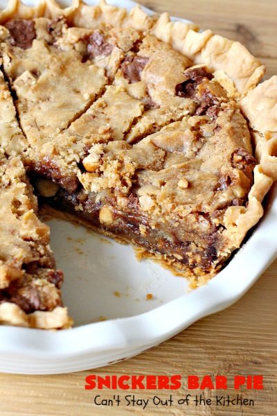 Snickers Bar Pie | Can't Stay Out of the Kitchen | this outrageously irresistible #pie is filled with #SnickersBars. Every bite contains #chocolate, #caramel & #peanuts. Fantastic for special occasions & #holidays like #ValentinesDay. #CaramelDessert #ChocolateDessert #HolidayDessert #PeanutButterDessert #SnickersDessert #SnickersCandyBars #SnickersBarPie #dessert