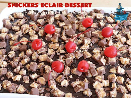 Snickers Éclair Dessert | Can't Stay Out of the Kitchen | this easy-peasy 6-ingredient #recipe is spectacular for company, potlucks or special occasions like #ValentinesDay. It includes layers of #ChocolatePudding, #GrahamCrackers, #ChocolateIcing and #SnickersCandyBars on top. The #Snickers give it that wonderful chocolaty & #caramel flavor along with #peanuts that adds a little punch to the #dessert. So easy even a child can make it! #Éclairs #ÉclairDessert #SnickersÉclairDessert