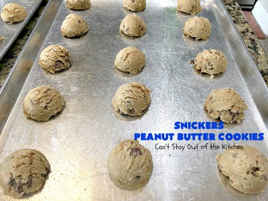 Snickers Peanut Butter Cookies | Can't Stay Out of the Kitchen | these luscious #cookies are loaded with #SnickersPeanutButterBars. The #caramel, #chocolate & #PeanutButter flavors really come through making this one dynamite #dessert. If you enjoy #SnickersCandyBars, you'll rave over this #SnickersDessert. #PeanutButterDessert #ChocolateDessert #HolidayDessert #CaramelDessert #SnickersPeanutButterCookies #tailgating #ChristmasCookieExchange