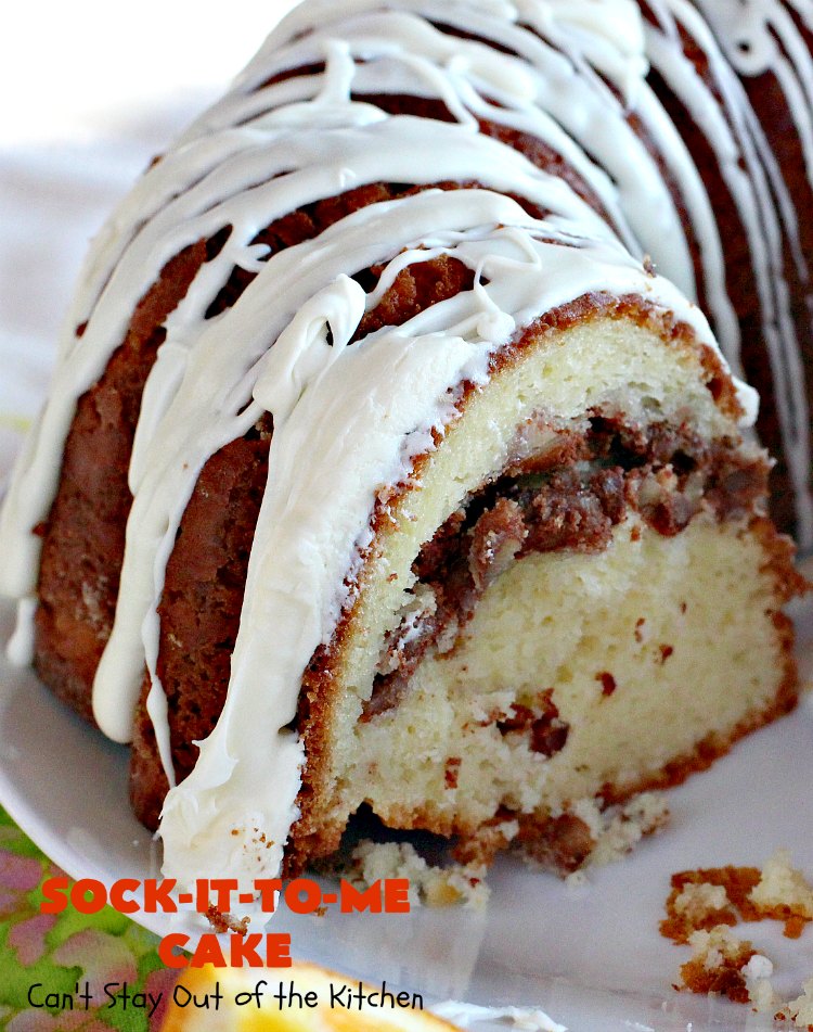 Sock-It-To-Me Cake | Can't Stay Out of the Kitchen | this fantastic #cake will knock your socks off! It has a lovely #pecan streusel filling in the middle & it's glazed with vanilla icing. We serve this as a #coffeecake for #breakfast or for #dessert. #Brunch #Holiday #cinnamon #HolidayBreakfast #SockItToMeCake 