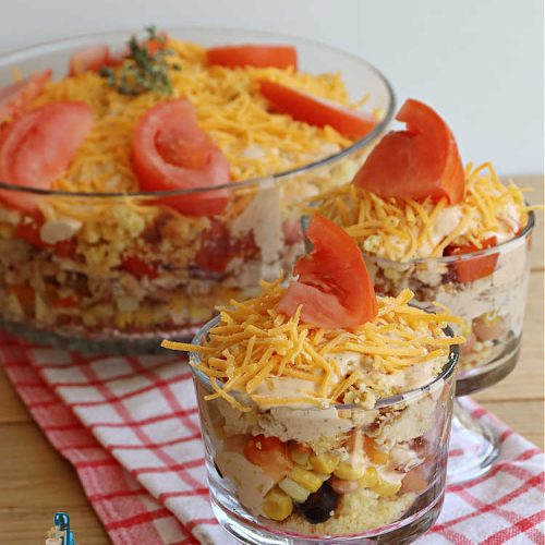 Southwestern Chicken and Cornbread Salad | Can't Stay Out of the Kitchen | this fantastic #TexMex #salad includes #chicken, #cornbread, #beans, #corn, #tomatoes & #olives & #SpicyRanchDressing. It's a great salad to serve as a #MainDish during the hot days of summer. This scrumptious #recipe is delightful for company gatherings & potlucks. #HiddenValley #SouthwesternChickenAndCornbreadSalad