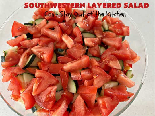 Southwestern Layered Salad | Can't Stay Out of the Kitchen | this scrumptious #LayeredSalad is perfect for company or a crowd since it makes a lot! If you enjoy #TexMex flavor in your #salad or a #TacoSalad this #salad will be right up your alley. The #Southwestern flavors are marvelous & the heartiness of two types of #beans & #corn make this a #MainDishSalad that can't be beat! #bacon #tomatoes #CheddarCheese #Fritos #olives #RanchDressing #FritosCornChips #avocados #pork #SouthwesternLayeredSalad #GlutenFree