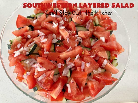 Southwestern Layered Salad | Can't Stay Out of the Kitchen | this scrumptious #LayeredSalad is perfect for company or a crowd since it makes a lot! If you enjoy #TexMex flavor in your #salad or a #TacoSalad this #salad will be right up your alley. The #Southwestern flavors are marvelous & the heartiness of two types of #beans & #corn make this a #MainDishSalad that can't be beat! #bacon #tomatoes #CheddarCheese #Fritos #olives #RanchDressing #FritosCornChips #avocados #pork #SouthwesternLayeredSalad #GlutenFree