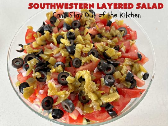 Southwestern Layered Salad | Can't Stay Out of the Kitchen | this scrumptious #LayeredSalad is perfect for company or a crowd since it makes a lot! If you enjoy #TexMex flavor in your #salad or a #TacoSalad this #salad will be right up your alley. The #Southwestern flavors are marvelous & the heartiness of two types of #beans & #corn make this a #MainDishSalad that can't be beat! #bacon #tomatoes #CheddarCheese #Fritos #olives #RanchDressing #FritosCornChips #avocados #pork #SouthwesternLayeredSalad #GlutenFree