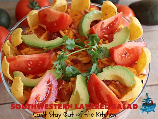 Southwestern Layered Salad | Can't Stay Out of the Kitchen | this scrumptious #LayeredSalad is perfect for company or a crowd since it makes a lot! If you enjoy #TexMex flavor in your #salad or a #TacoSalad this #salad will be right up your alley. The #Southwestern flavors are marvelous & the heartiness of two types of #beans & #corn make this a #MainDishSalad that can't be beat! #bacon #tomatoes #CheddarCheese #Fritos #olives #RanchDressing #FritosCornChips #avocados #pork #SouthwesternLayeredSalad #GlutenFree