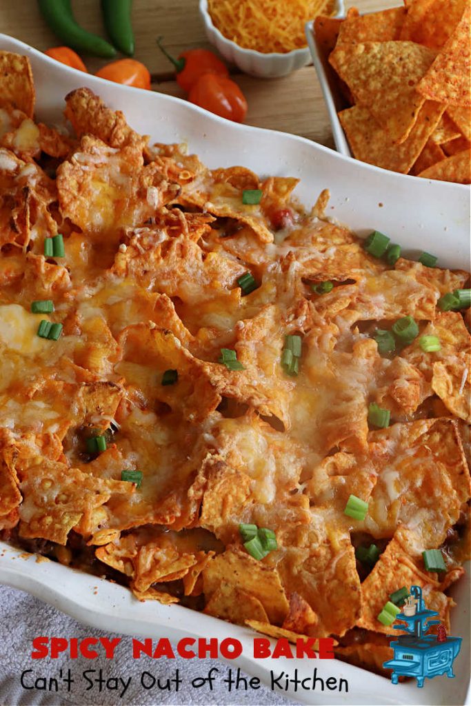 Spicy Nacho Bake | Can't Stay Out of the Kitchen | let this scrumptious #TexMex #entree captivate you with its delicious filling layered between layers of #NachoCheeseDoritos & #CheddarCheese. The filling includes #GroundBeef #corn #tomatoes, #TacoSeasoning, #ChiliBeans & #BlackBeans. This tasty #casserole can be whipped up & ready to serve in about an hour. #SpicyNachoBake