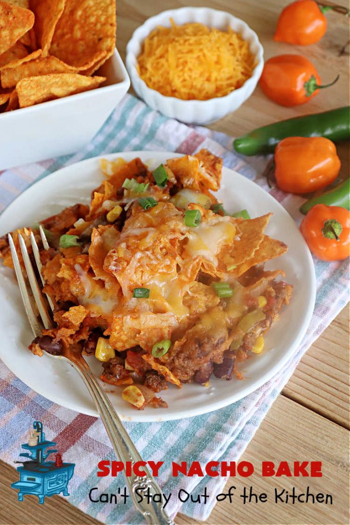 Spicy Nacho Bake | Can't Stay Out of the Kitchen | let this scrumptious #TexMex #entree captivate you with its delicious filling layered between layers of #NachoCheeseDoritos & #CheddarCheese. The filling includes #GroundBeef #corn #tomatoes, #TacoSeasoning, #ChiliBeans & #BlackBeans. This tasty #casserole can be whipped up & ready to serve in about an hour. #SpicyNachoBake