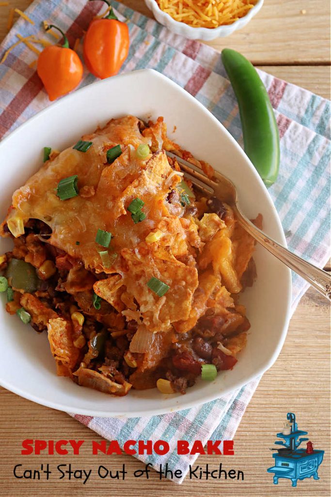 Spicy Nacho Bake | Can't Stay Out of the Kitchen | let this scrumptious #TexMex #entree captivate you with its delicious filling layered between layers of #NachoCheeseDoritos & #CheddarCheese. The filling includes #GroundBeef #corn #tomatoes, #TacoSeasoning, #ChiliBeans & #BlackBeans. This tasty #casserole can be whipped up & ready to serve in about an hour. #SpicyNachoBake