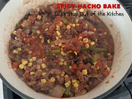 Spicy Nacho Bake | Can't Stay Out of the Kitchen | let this scrumptious #TexMex #entree captivate you with its delicious filling layered between layers of #NachoCheeseDoritos & #CheddarCheese. The filling includes #GroundBeef #corn #tomatoes, #TacoSeasoning, #ChiliBeans & #BlackBeans. This tasty #casserole can be whipped up & ready to serve in about an hour. #SpicyNachoBake