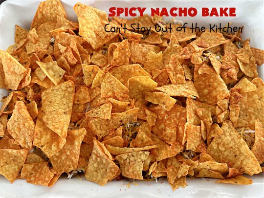 Spicy Nacho Bake | Can't Stay Out of the Kitchen | let this scrumptious #TexMex #entree captivate you with its delicious filling layered between layers of #NachoCheeseDoritos & #CheddarCheese. The filling includes #GroundBeef #corn #tomatoes, #TacoSeasoning, #ChiliBeans & #BlackBeans. This tasty #casserole can be whipped up & ready to serve in about an hour. #SpicyNachoBake