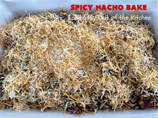 Spicy Nacho Bake | Can't Stay Out of the Kitchen | let this scrumptious #TexMex #entree captivate you with its delicious filling layered between layers of #NachoCheeseDoritos & #CheddarCheese. The filling includes #GroundBeef #corn #tomatoes, #TacoSeasoning, #ChiliBeans & #BlackBeans. This tasty #casserole can be whipped up & ready to serve in about an hour. #SpicyNachoBake