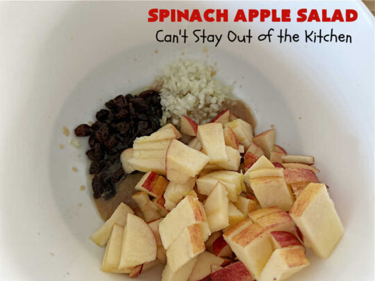 Spinach Apple Salad | Can't Stay Out of the Kitchen | the combination of flavors in this delicious #TossedSalad is wonderful. The #salad includes #apples, #spinach, #raisins & #VidaliaOnions in a tasty #applesauce #SaladDressing. It's easy to toss together at the last minute & pairs delightfully with any #MainDish. #healthy #LowCalorie #GlutenFree #vegan #SugarFree #SpinachApple Salad