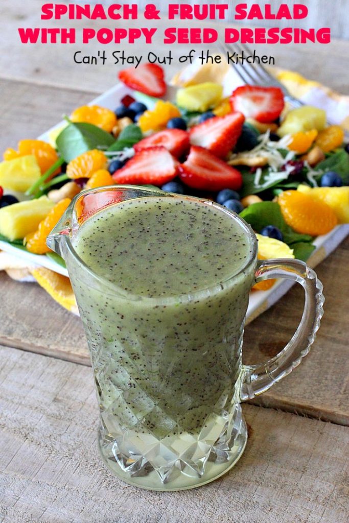 Spinach and Fruit Salad with Poppy Seed Dressing | this is one of our favorite #salad #recipes. It's filled with #strawberries, #Blueberries, #pineapple & #MandarinOranges. It also has #Cashews & #SwissCheese. No one can resist this amazing #TossedSalad! We serve it for company all the time. #holiday #HolidaySalad #TossedSaladWithFruit #SpinachSalad #SpinachAndFruitSaladWithPoppySeedDressing #PoppySeedDressing #GlutenFree #Healthy #HealthySaladRecipe