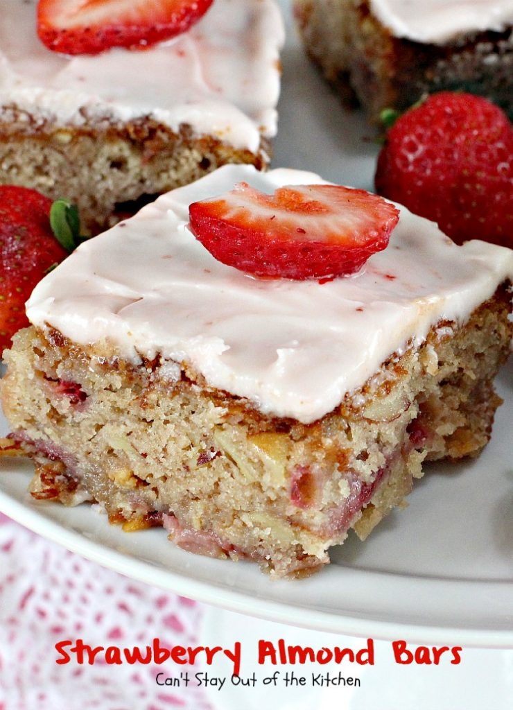 Strawberry Almond Bars | Can't Stay Out of the Kitchen | these luscious bars are made with #strawberries #almonds and #vanillachips and the icing is to die for! #dessert #cookie 