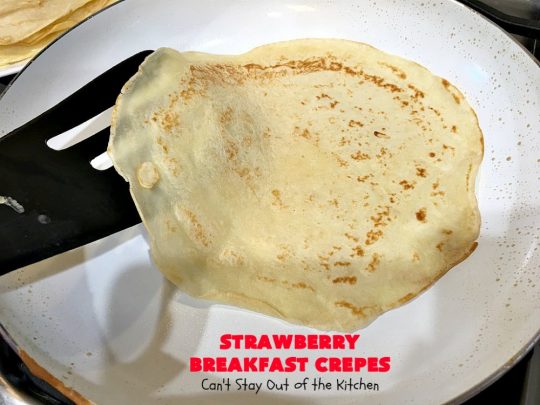 Strawberry Breakfast Crêpes | Can't Stay Out of the Kitchen | these lovely crêpes are filled with a luscious #strawberry filling. They're an excellent choice for a company or #holiday #breakfast. So rich & decadent they taste like eating #dessert! #BreakfastCrêpes #StrawberryBreakfastCrêpes