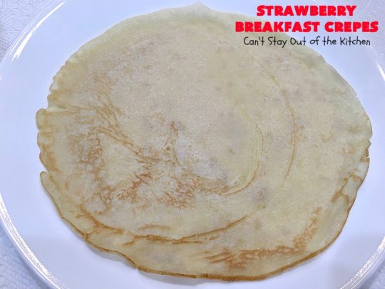 Strawberry Breakfast Crêpes | Can't Stay Out of the Kitchen | these lovely crêpes are filled with a luscious #strawberry filling. They're an excellent choice for a company or #holiday #breakfast. So rich & decadent they taste like eating #dessert! #BreakfastCrêpes #StrawberryBreakfastCrêpes