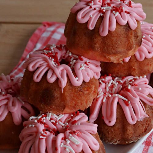 Strawberry Tea Cakes | Can't Stay Out of the Kitchen | these scrumptious #TeaCakes start with a #strawberry #CakeMix. These also include vanilla pudding & #WhiteChocolateChips. Beautiful, festive and elegant #dessert for #Christmas or #holiday baking. #cake #HolidayDessert #StrawberryDessert #StrawberryTeaCakes
