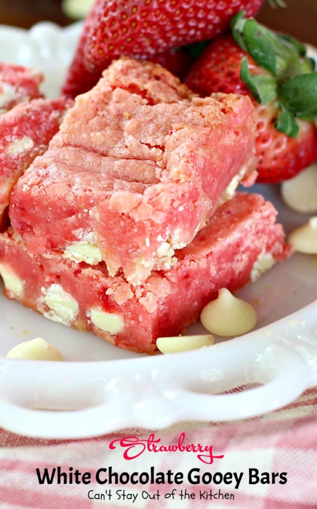 Strawberry White Chocolate Gooey Bars | Can't Stay Out of the Kitchen | these incredibly gooey #brownies are so easy & delicious. They start with a #strawberry #cakemix & are filled with #whitechocolatechips & sweetened #condensedmilk. #dessert #cookie #chocolate