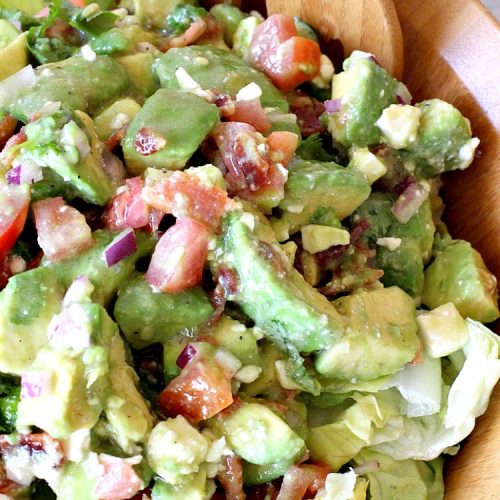 Tossed Guacamole Salad | Can't Stay Out of the Kitchen | My favorite #Guacamole #recipe served with #bacon, #FetaCheese & tossed with lettuce & a Honey Vinaigrette. Perfect #salad for company & #holidays like #FathersDay. #TossedSalad #GlutenFree #TossedGuacamoleSalad #TexMex #avocados