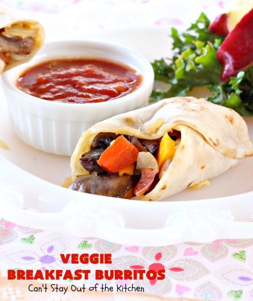 Veggie Breakfast Burritos | Can't Stay Out of the Kitchen | these delicious #burritos are terrific for on-the-go breakfasts. They can be refrigerated or frozen and microwaved just before you're heading out the door! This #healthy #breakfast option is wonderful for company or #MeatlessMondays too. #tomatoes #bellpeppers #mushrooms #tortillas #CheddarCheese #eggs #holiday #HolidayBreakfast #VeggieBreakfastBurritos #BreakfastBurritos #HealthyBreakfastBurritos