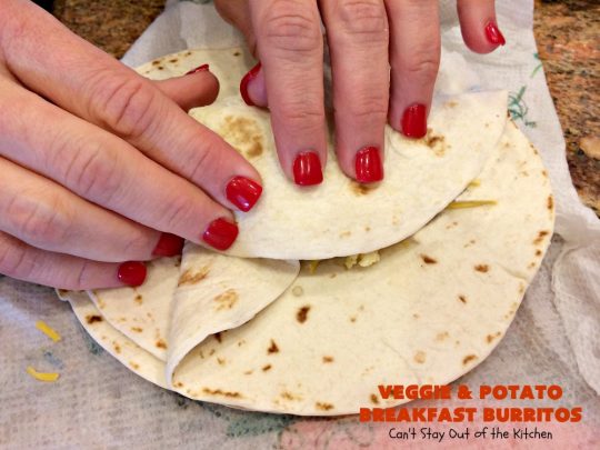 Veggie and Potato Breakfast Burritos | Can't Stay Out of the Kitchen | these delightful #BreakfastBurritos are awesome for a weekend, company or #holiday #breakfast. They can easily be prepared & frozen in advance & then microwaved before serving. Terrific for a grab and go breakfast too. #Tortillas #eggs #CheddarCheese #mushrooms #potatoes #Vegetarian #vegetables #VeggieAndPotatoBreakfastBurritos #brunch #HolidayBreakfast #MeatlessMondays