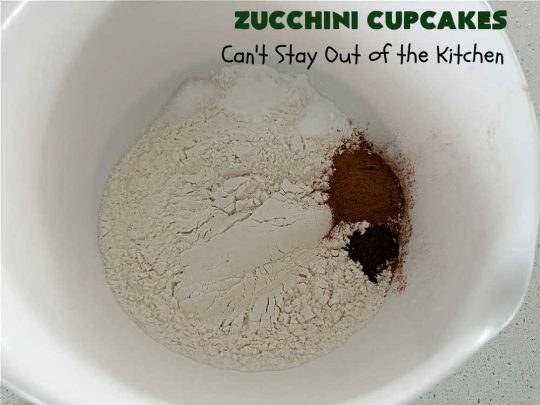 Zucchini Cupcakes | Can't Stay Out of the Kitchen | these scrumptious #cupcakes include grated #zucchini, #OrangeJuice, #cinnamon, #cloves & #AlmondExtract for an exquisite pop in flavor everyone loves. The #caramel #frosting is to die for! Perfect #dessert for any #tailgating party or #BackyardBarbecue. #ZucchiniCupcakes